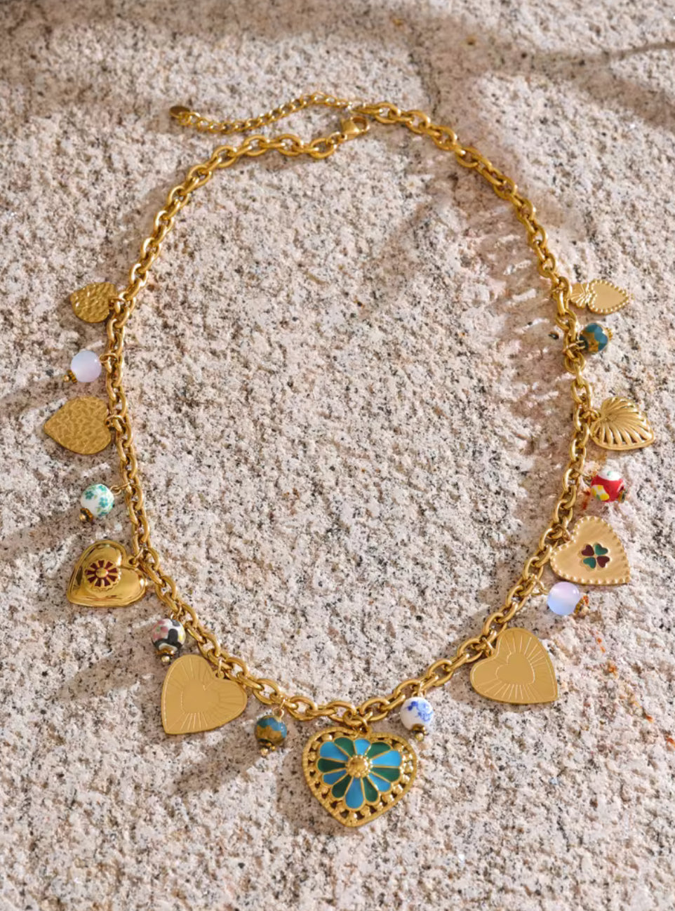 18K gold-plated shell necklace – hypoallergenic and tarnish-resistant jewelry. Dainty butterfly charm necklace – gold-plated and hypoallergenic.